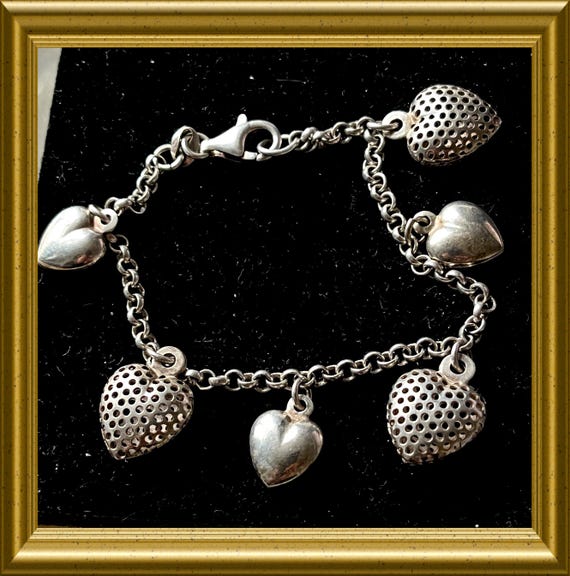 Vintage silver bracelet with heart charms