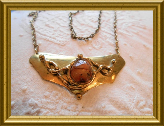 Vintage necklace with brass pendant and stone