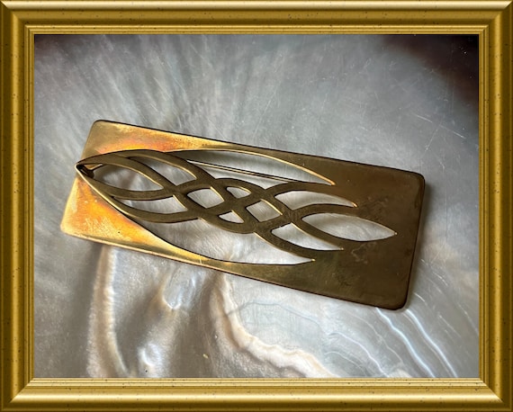 Vintage brass brooch