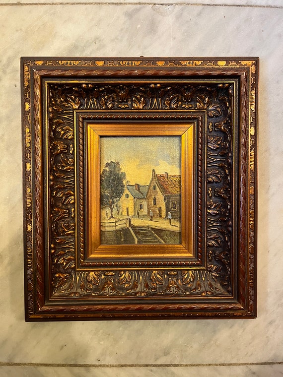 Vintage signed painting in wide frame: village