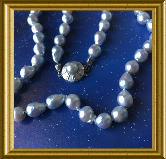 Lovely gray pearl necklace with 14 carat white gold closure