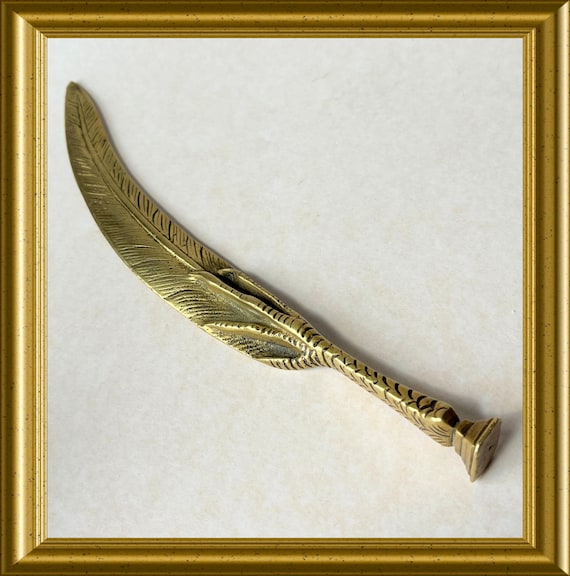 Vintage brass seal / letter opener: claw, feather