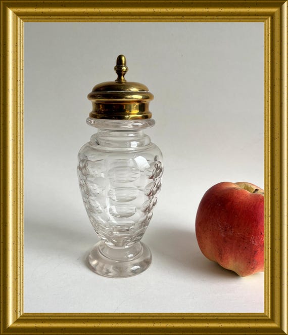 Elegant antique cut glass jar with lid