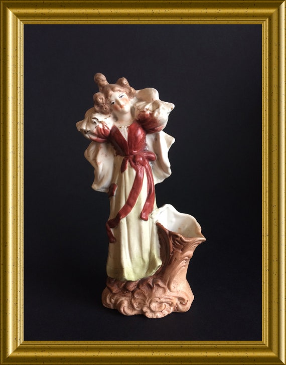 Antique bisque porcelain figurine