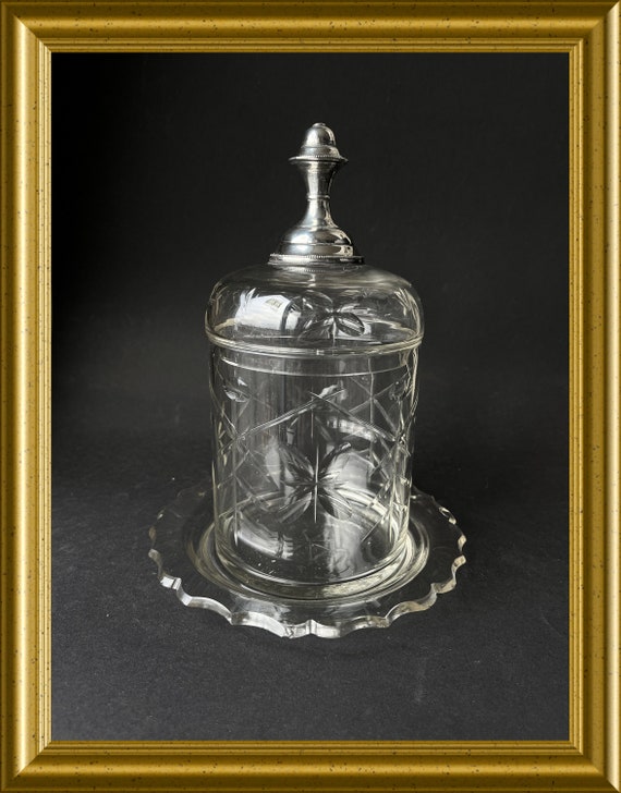 Antique cut glass lidded jar with underplate, silver knob