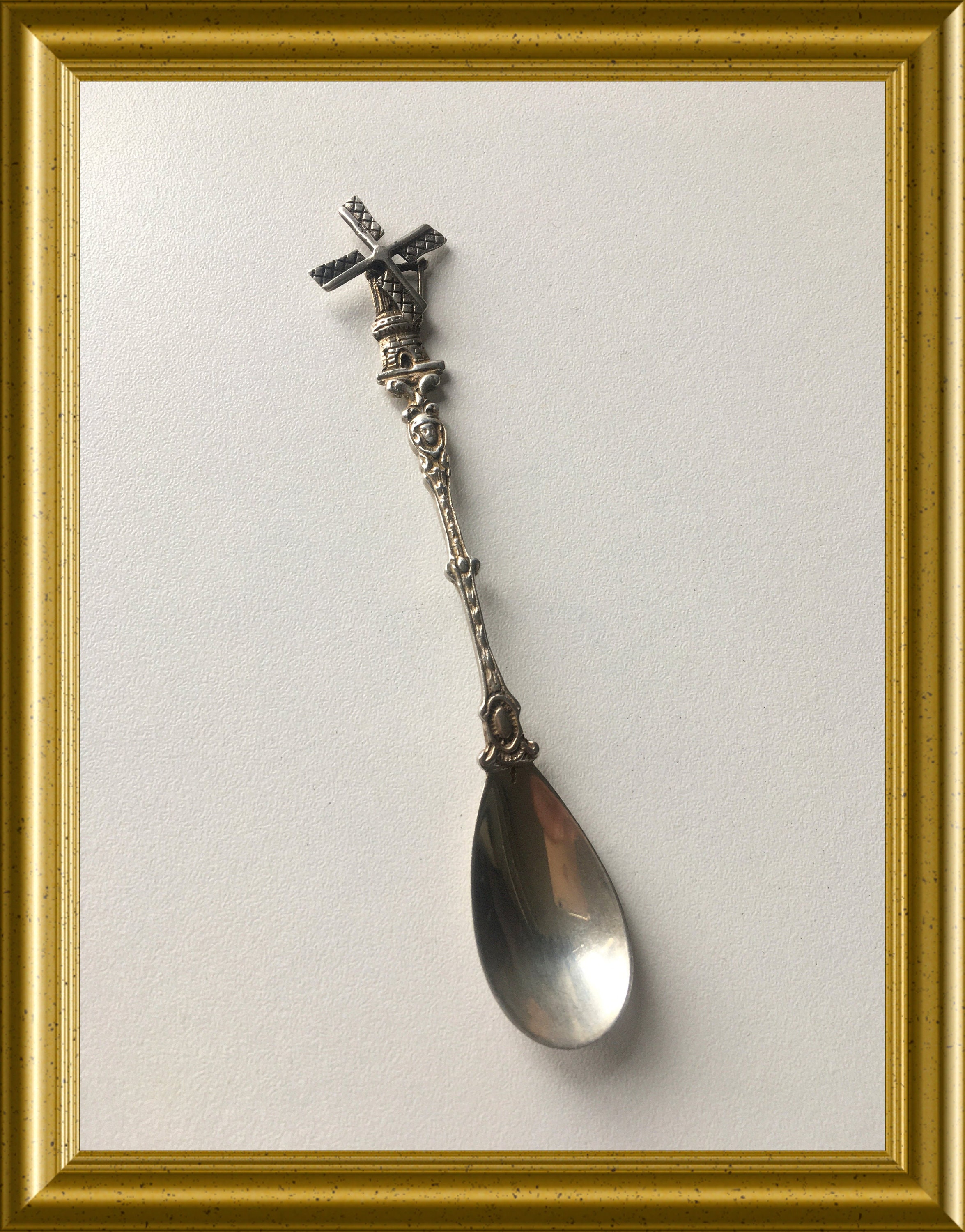 Vintage Dutch silver spoon windmill with spinning blades