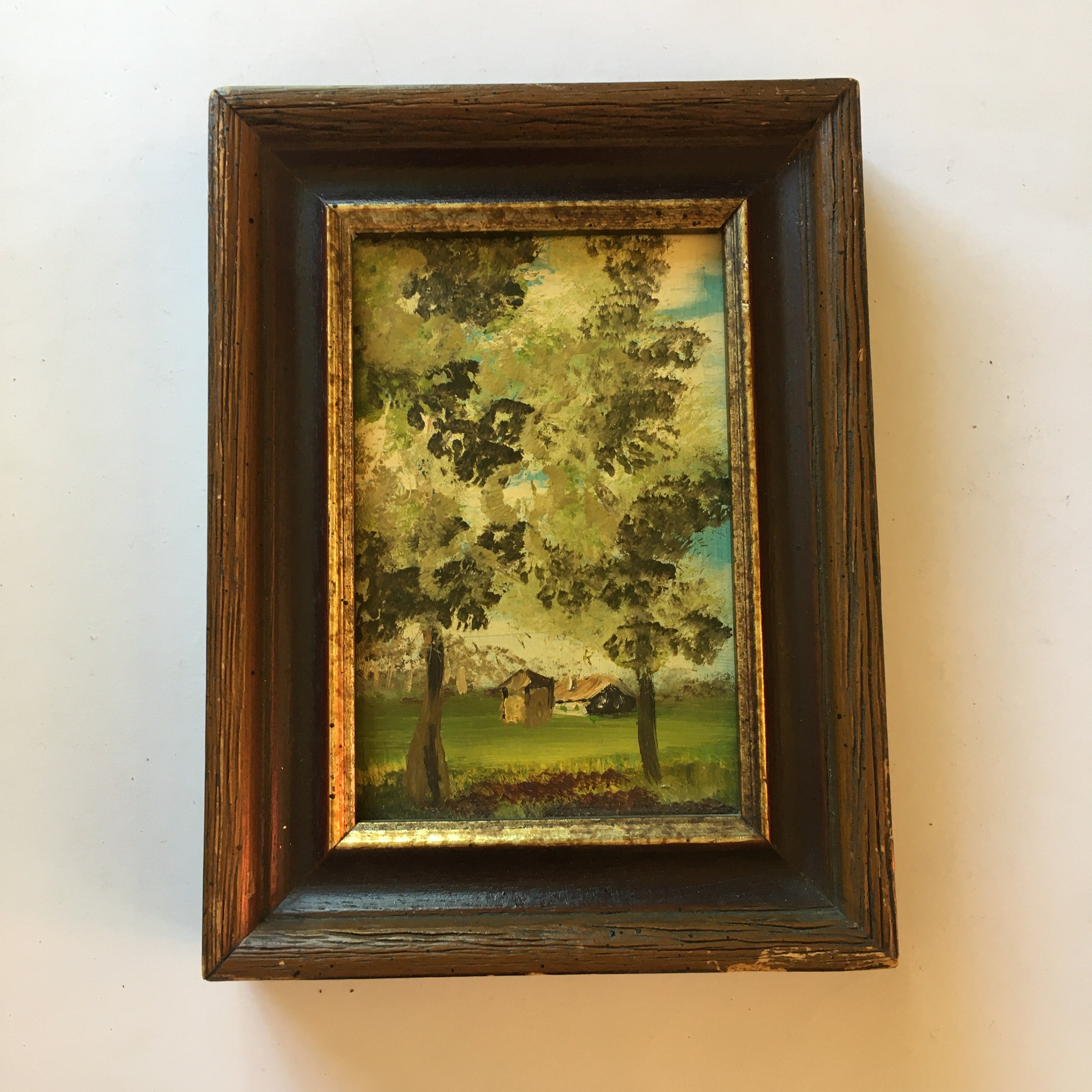 Two vintage small frames/ paintings trees, house