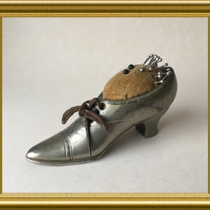 Old chrome plated pewter figurine/ pin cushion: shoe