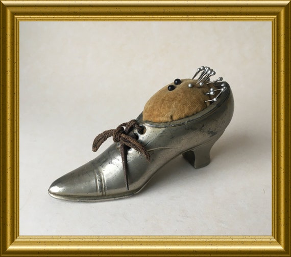 Old chrome plated pewter figurine/ pin cushion: shoe