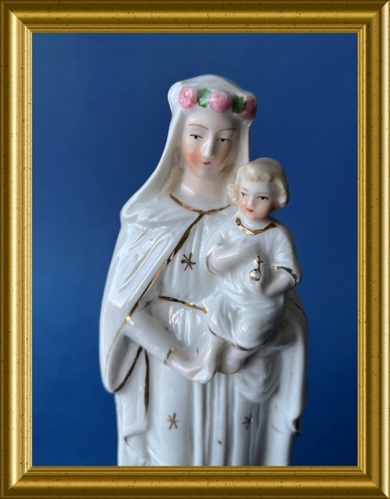 Antique porcelain figurine: Holy Mary with child Jesus