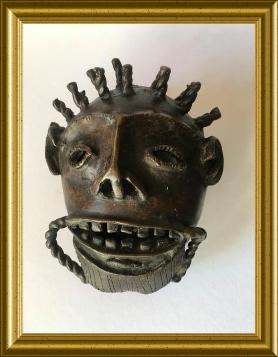 Old small African bronze mask