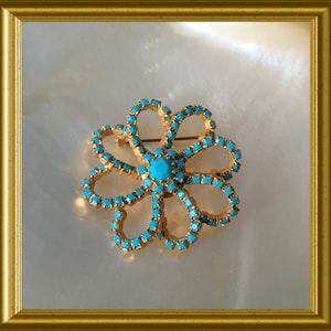 Vintage strass brooch: costume jewelry, turquoise blue stones