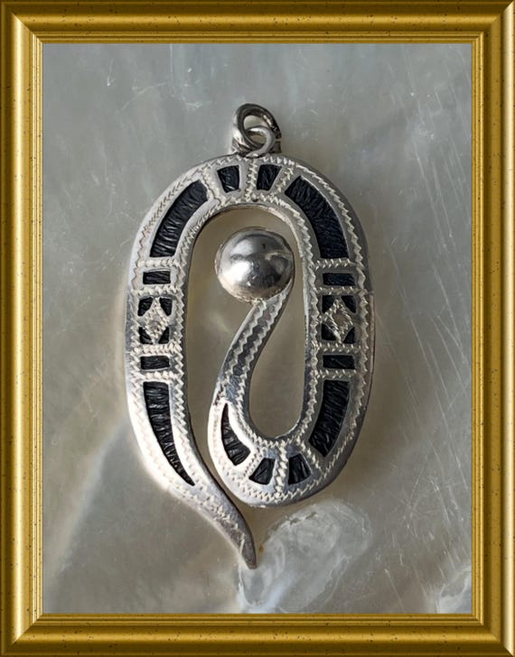 Vintage silver with black pendant
