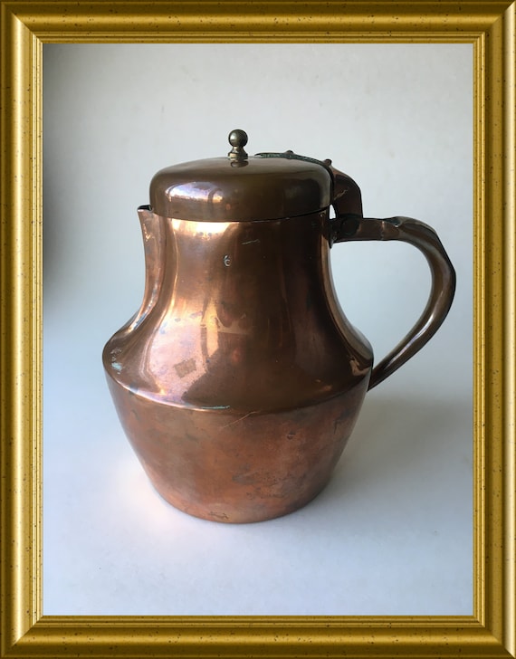 Antique lidded copper jug