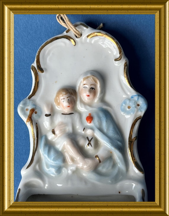Antique porcelain holy water font: Mary with child