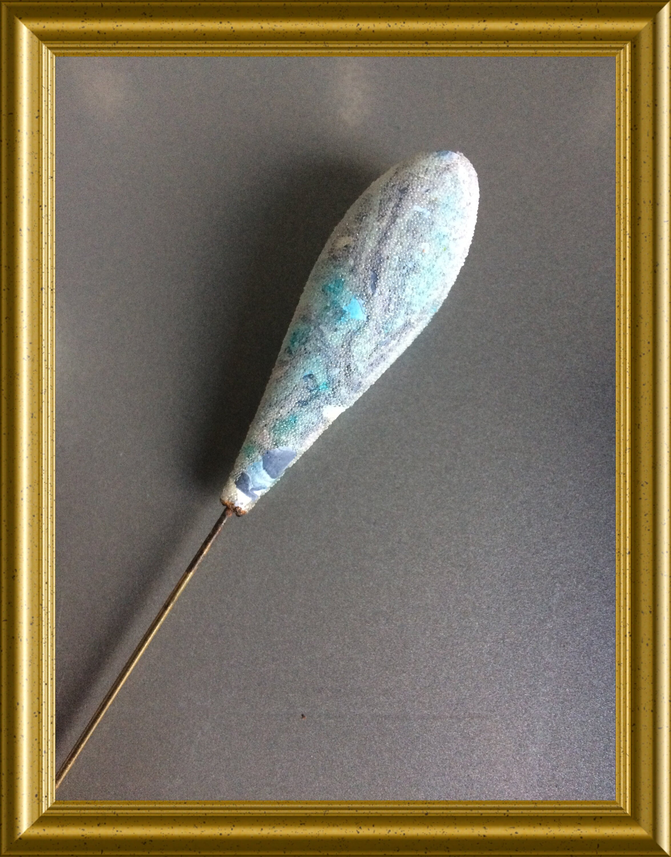 Two lovely long antique glass hat pins