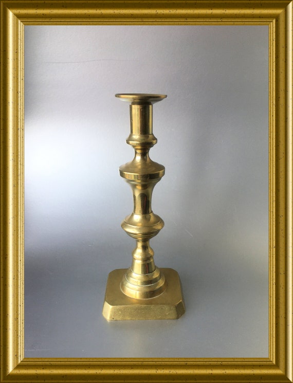 Antique brass candle holder