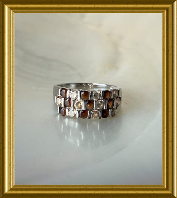 Beautiful silver ring with brown stones