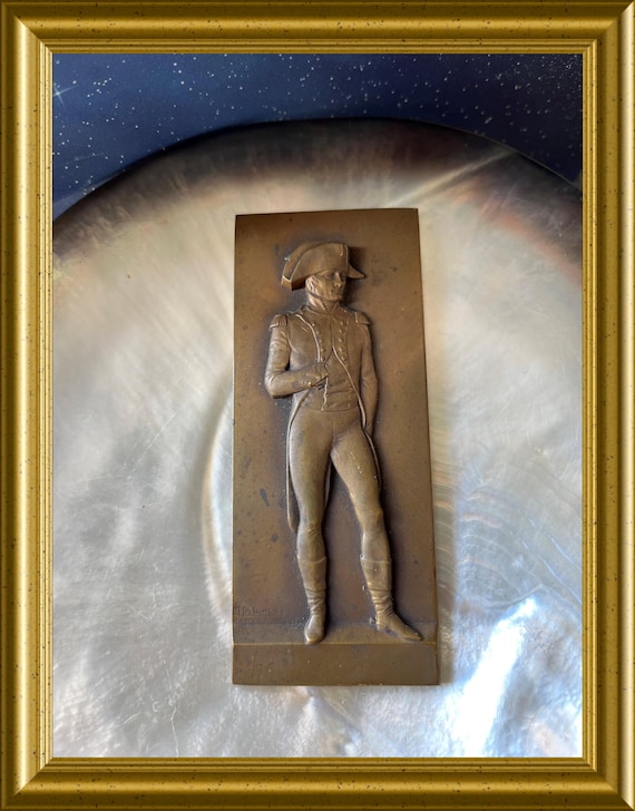 Old small bronze relief plaque of Napoleon Bonaparte