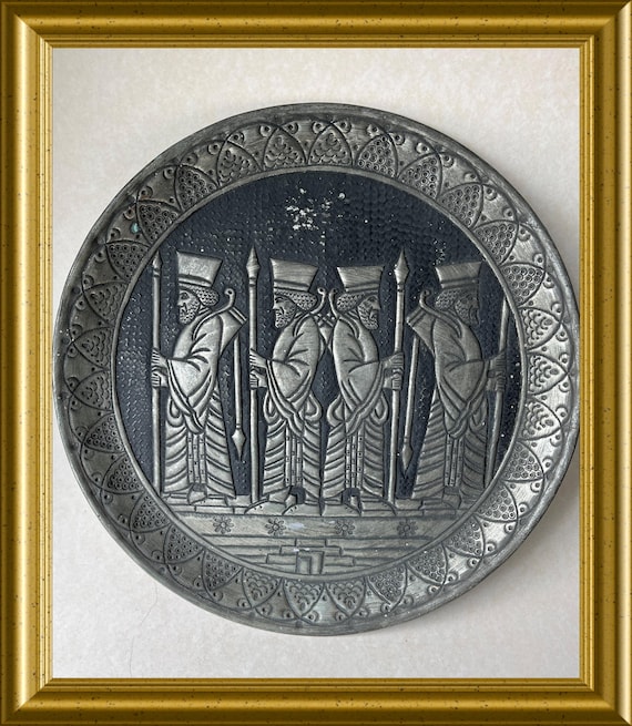 Vintage metal relief wall hanging plate