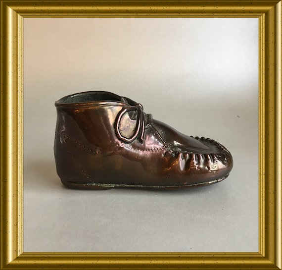 Vintage bronzed children's shoe