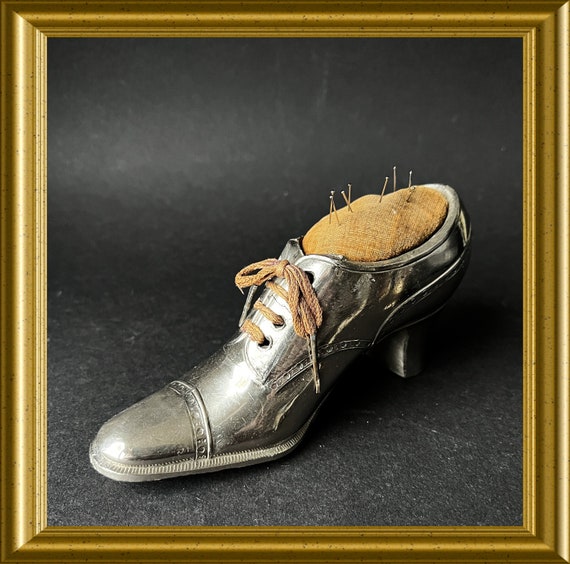 Vintage chrome plated pewter figurine/ pin cushion: shoe