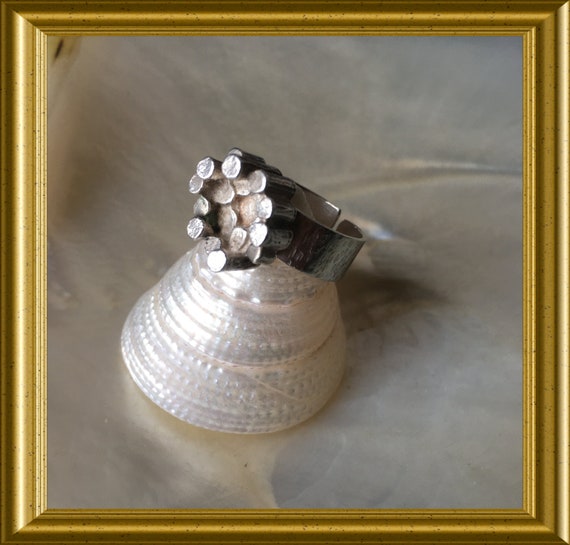 Beautiful silver design ring with rods