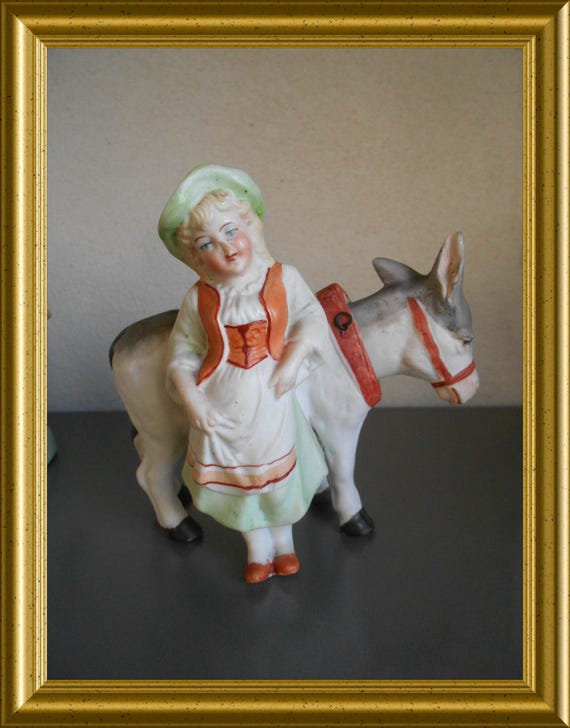 Antique bisque porcelain figurine: donkey with nodding head
