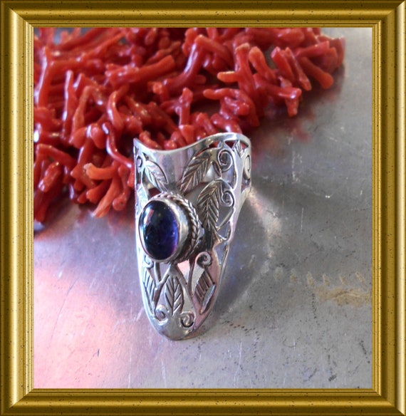 Beautiful big silver ring with blue / purple cabochon stone