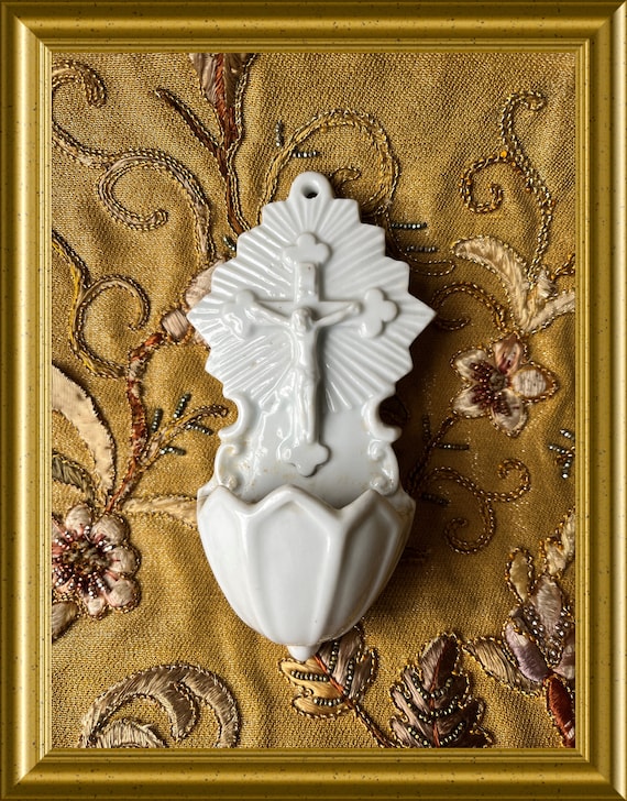 Antique white porcelain holy water font: crucifix, cross
