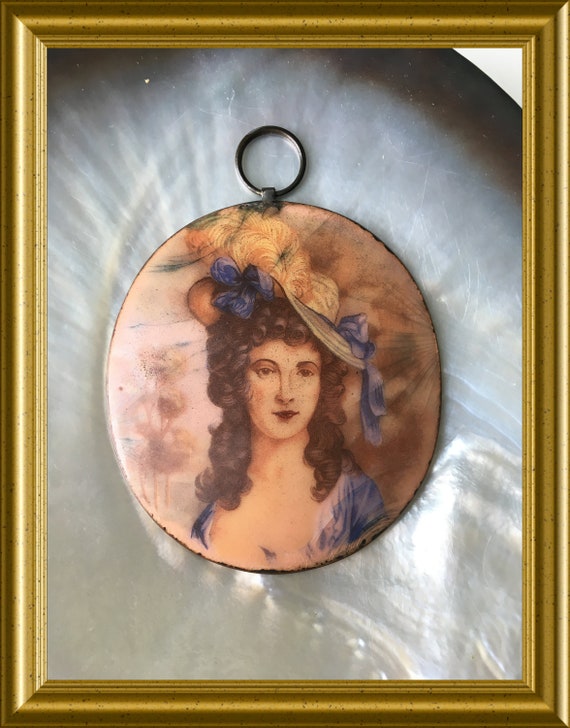 Vintage brass plaque: portrait lady with hat