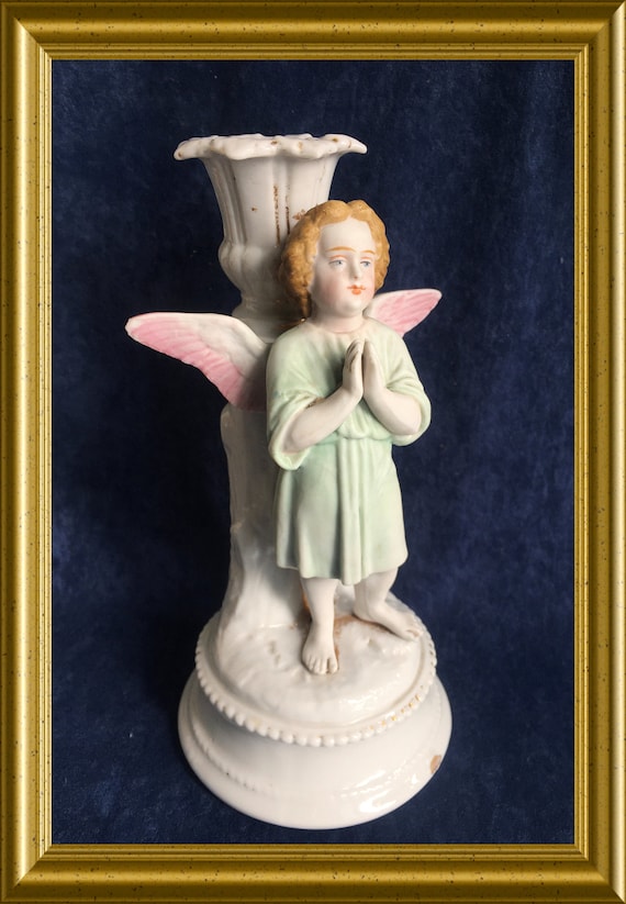 Antique porcelain candle holder: standing angel