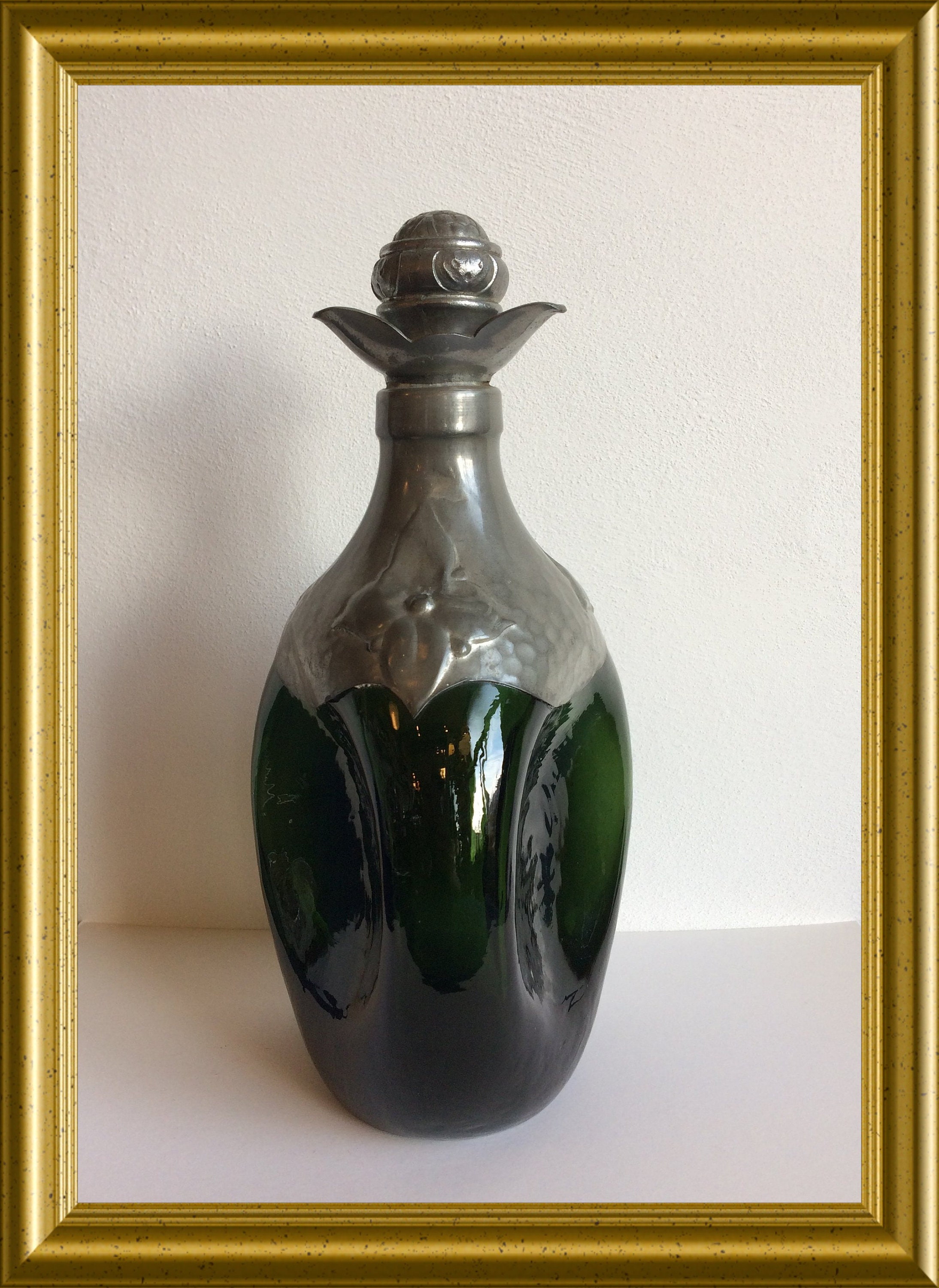 Vintage green glass bottle, decanter with pewter overlay and stopper, Denmark