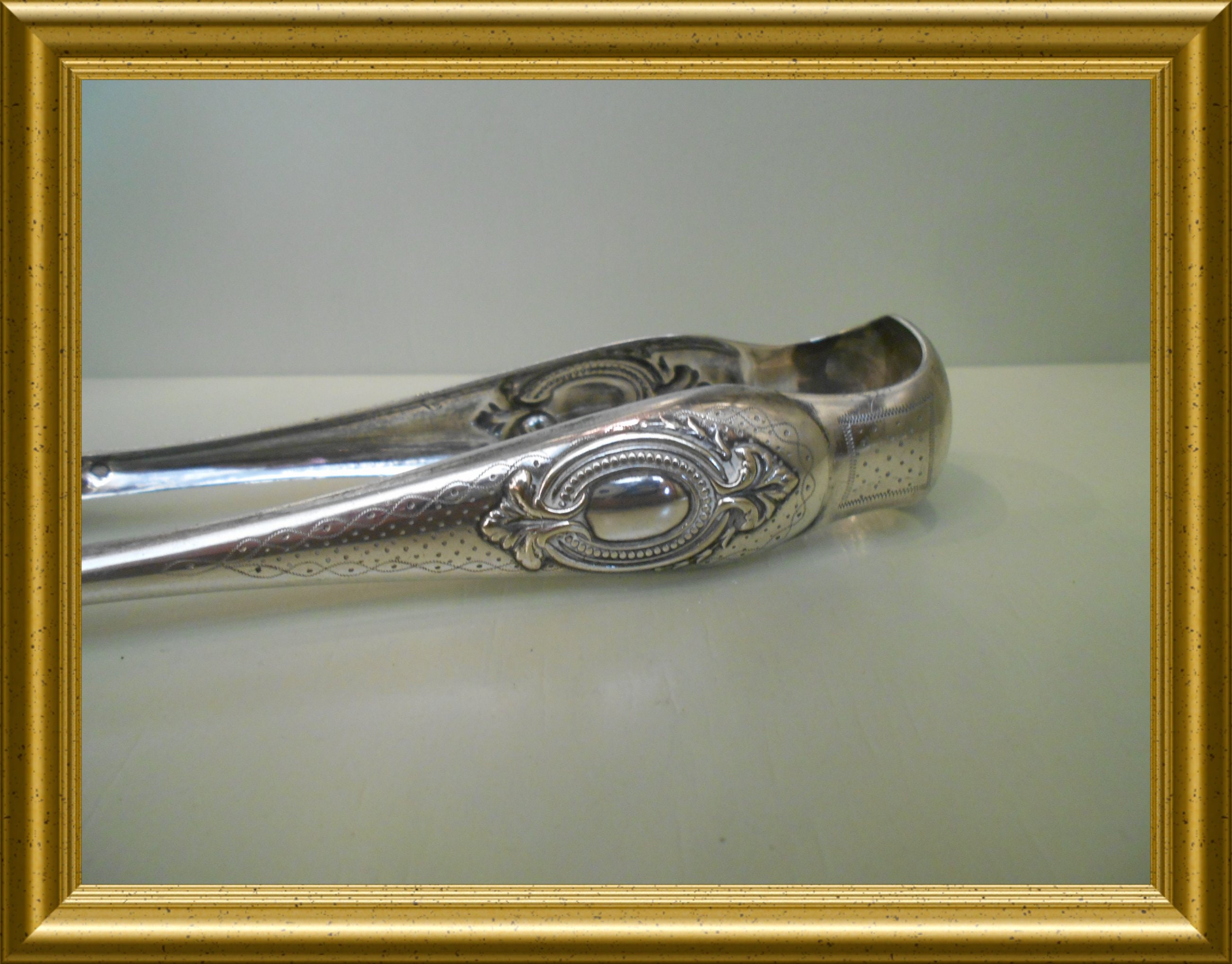 Antique silver plated sugar tongs / ice tongs, with claws