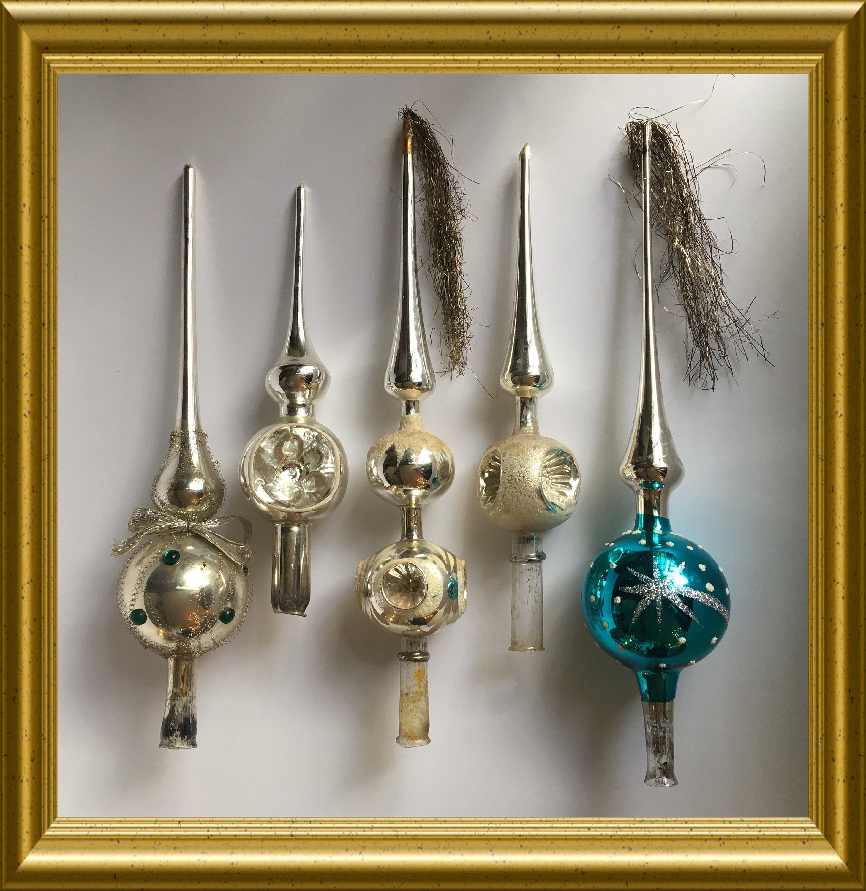 Vintage blue glass tree topper with a star, celestial tree topper