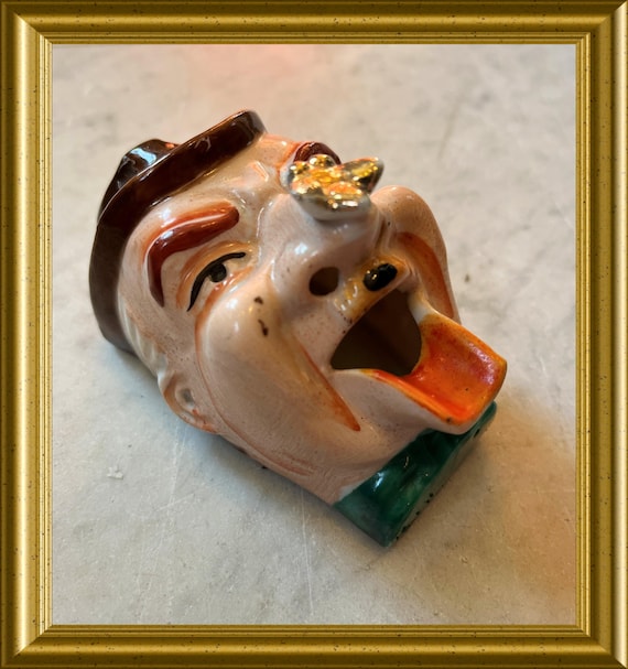 Vintage Japanese porcelain ashtray: man with fly/ bee on nose
