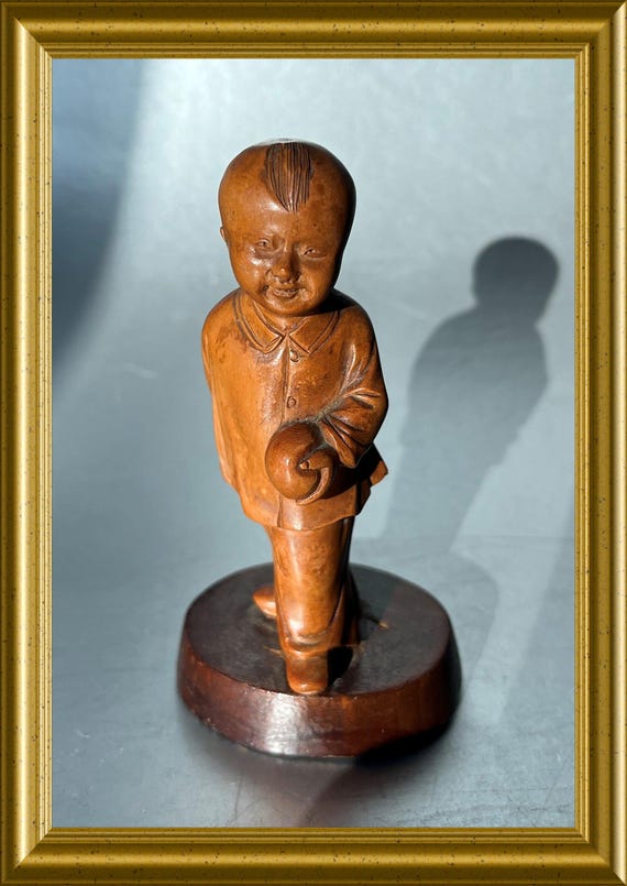 Vintage Chinese wooden figurine: child