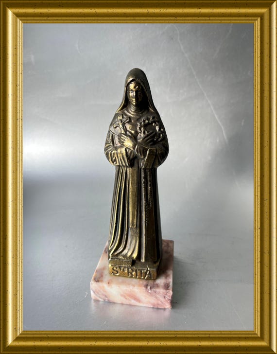 Vintage metal figurine: saint Rita