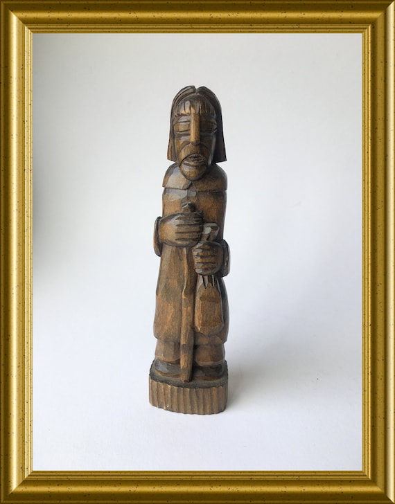 Art deco woodcarving: wooden figurine, man with walking stick