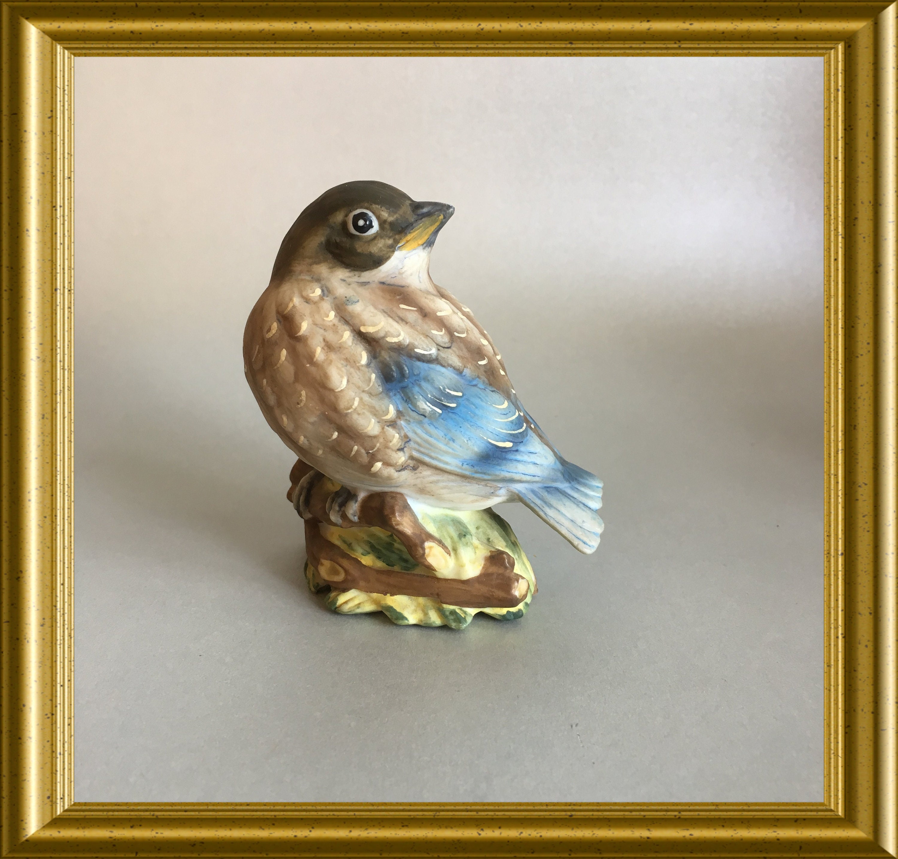 Vintage porcelain bird figurine