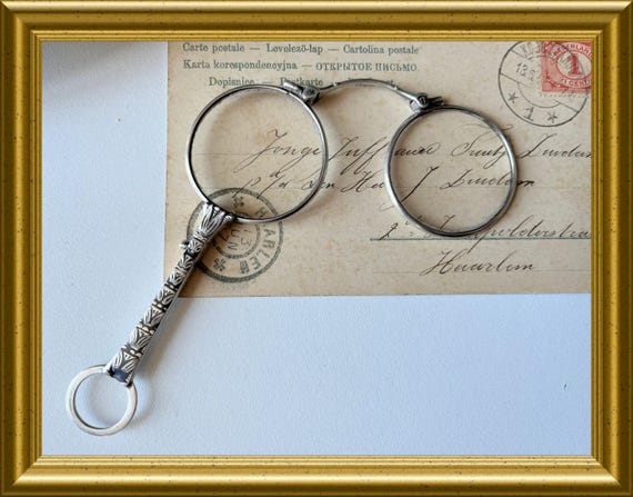 Antique lorgnette, eye glasses, spectacles, folding glasses