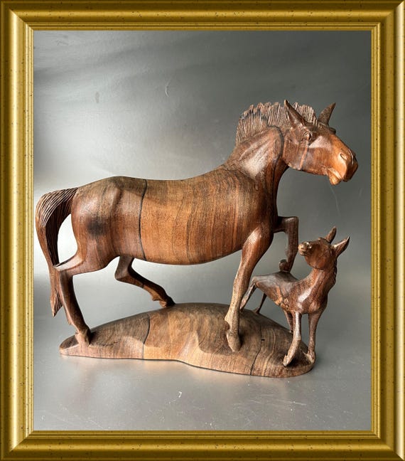 Vintage woodcarving: wooden figurine, horse with foal