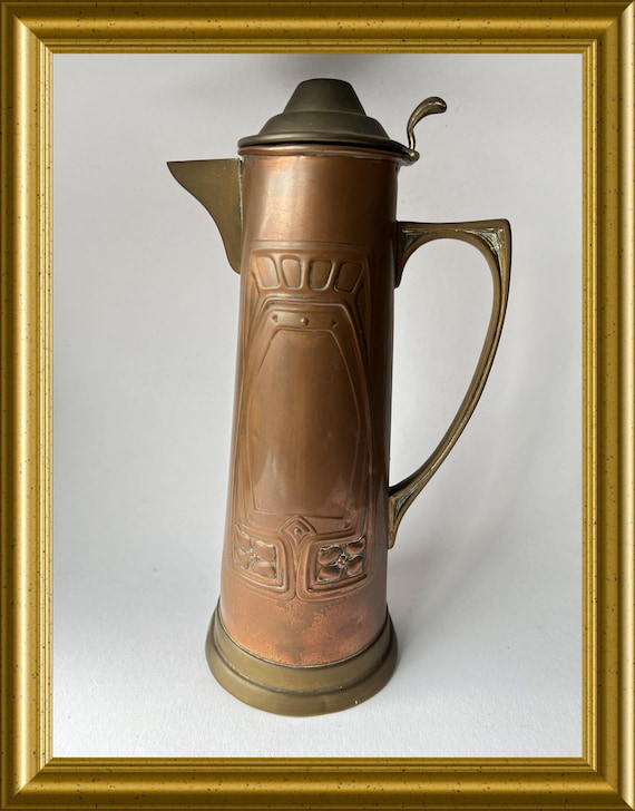 Art nouveau lidded copper jug: F&R Fischer, Goppingen, Germany
