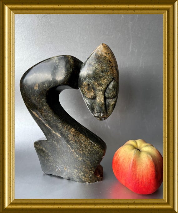 Vintage African signed stone sculpture by Maynard