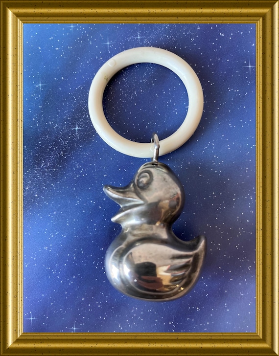 Vintage silver plated rattle with teething ring: duck
