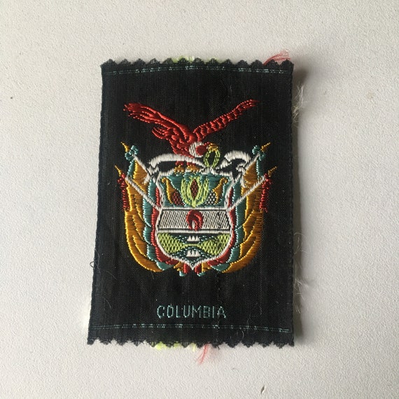 Vintage Dutch woven tobacco silk: arms Columbia