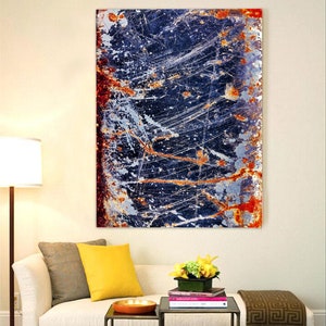 Pode incluir: Impress&atilde;o de arte abstrata com um esquema de cores azul, branco e laranja. A impress&atilde;o representa uma superf&iacute;cie texturizada com um aspecto desgastado, que lembra metal enferrujado.