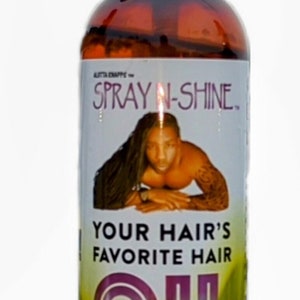 May include: A brown bottle of hair oil with a black spray nozzle. The label features the text "SPRAY N-SHINE" and "YOUR HAIR'S FAVORITE HAIR OIL". The bottle contains 8 fl oz (237 ml) of product.