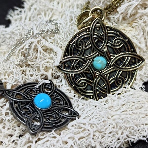 Amulet earrings deals