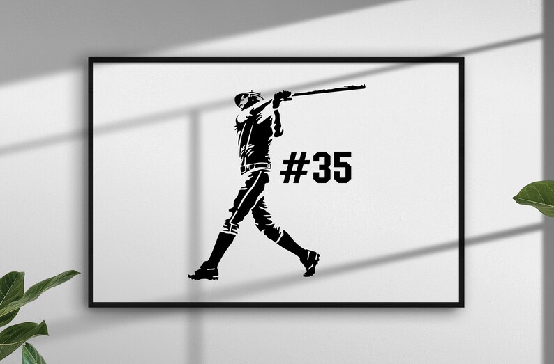 May include: Black and white silhouette of a baseball player in a batting stance with a bat raised above their head. The number 35 is printed on the right side of the image.